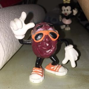 California Raisin figurine with Sunglasses.